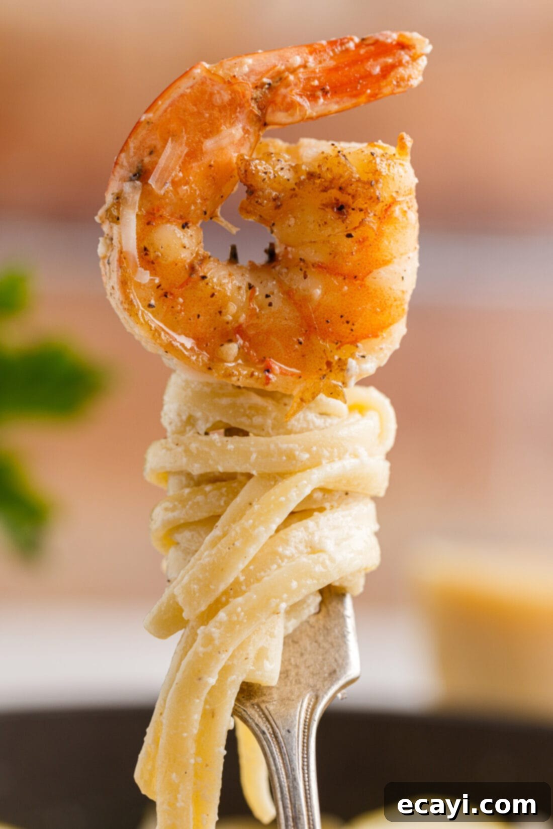 Creamy Garlic Shrimp Pasta 15 Close-up of Creamy Lemon Garlic Shrimp Pasta on a Fork
