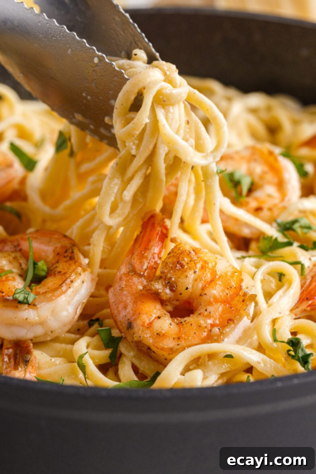 Creamy Garlic Shrimp Pasta 3 Serving Creamy Lemon Garlic Shrimp Pasta with Tongs