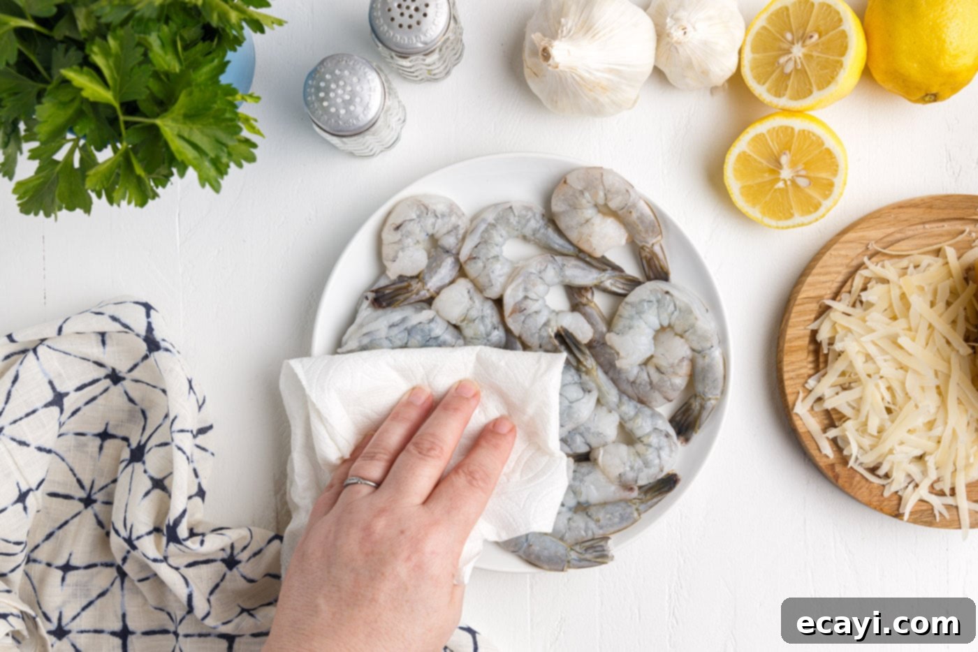 Creamy Garlic Shrimp Pasta 5 Patting Raw Shrimp Dry with Paper Towels for Searing