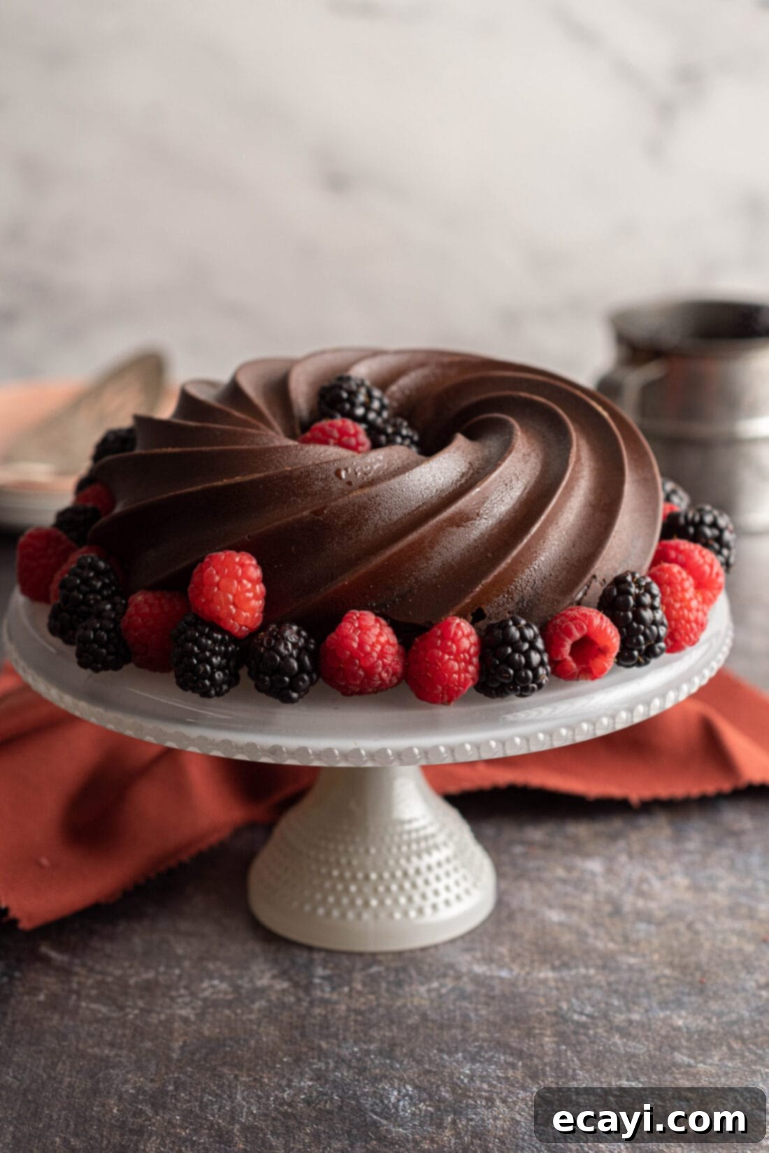 Rich Chocolate Pound Cake 3 Chocolate Pound Cake on a cake plate