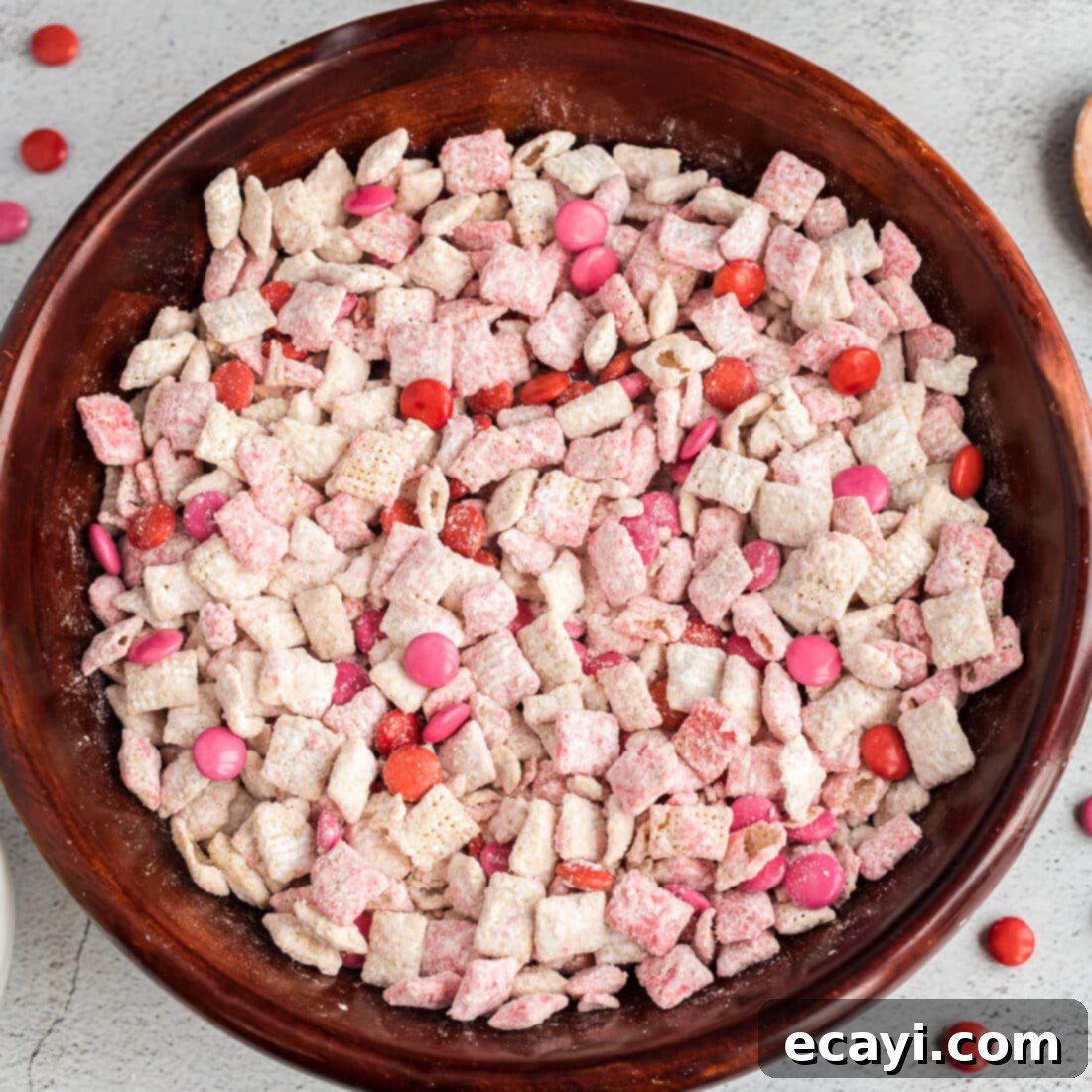 Sweetheart Muddy Buddies 11 A large bowl filled with festive Valentine Muddy Buddies