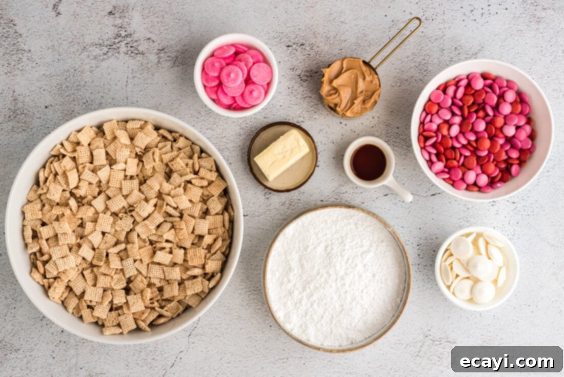 Sweetheart Muddy Buddies 4 A flat lay photograph showcasing the ingredients needed to make Valentine Muddy Buddies