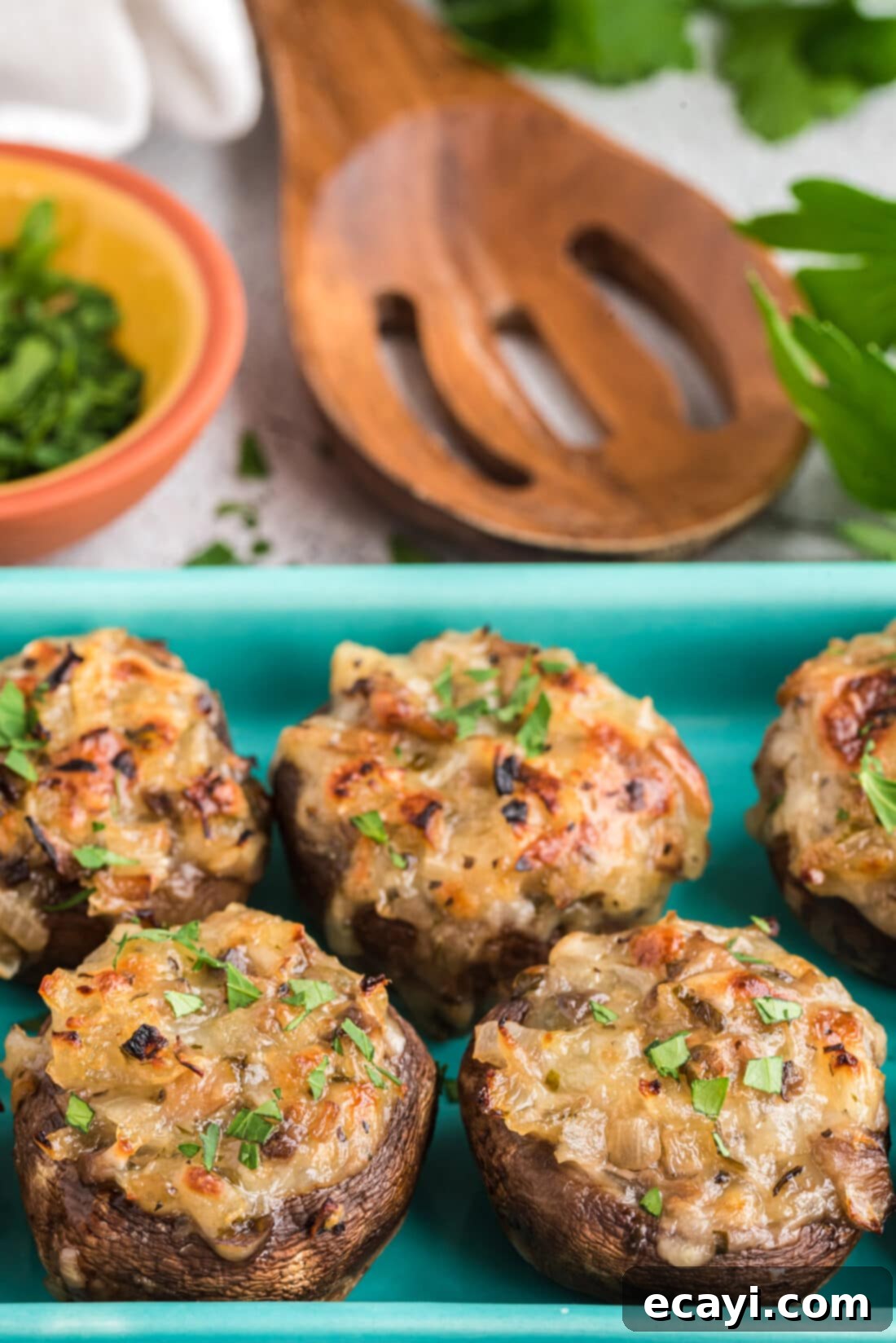 Gourmet Mushroom Poppers 3 Stuffed mushrooms arranged neatly on a baking tray, showcasing their readiness for the oven.