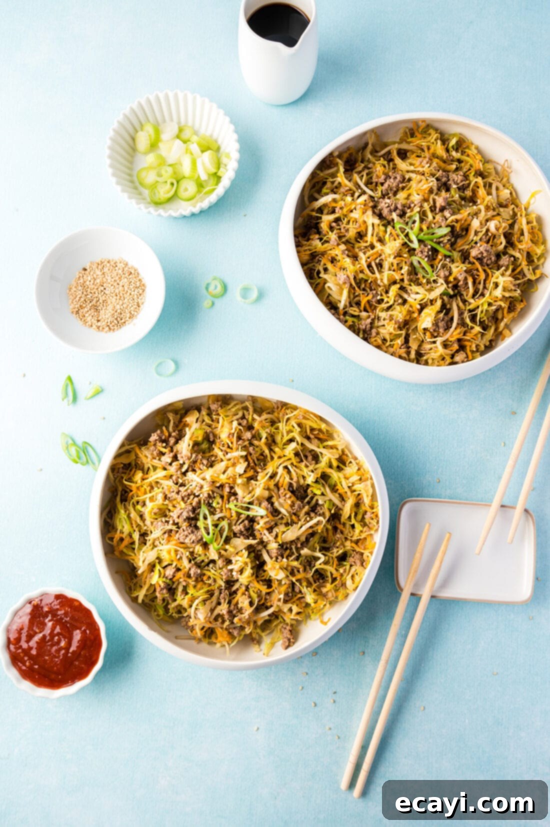 Egg Roll Stir-Fry Bowl 3 Two bowls of Egg Roll in a Bowl, garnished with sesame seeds and green onions