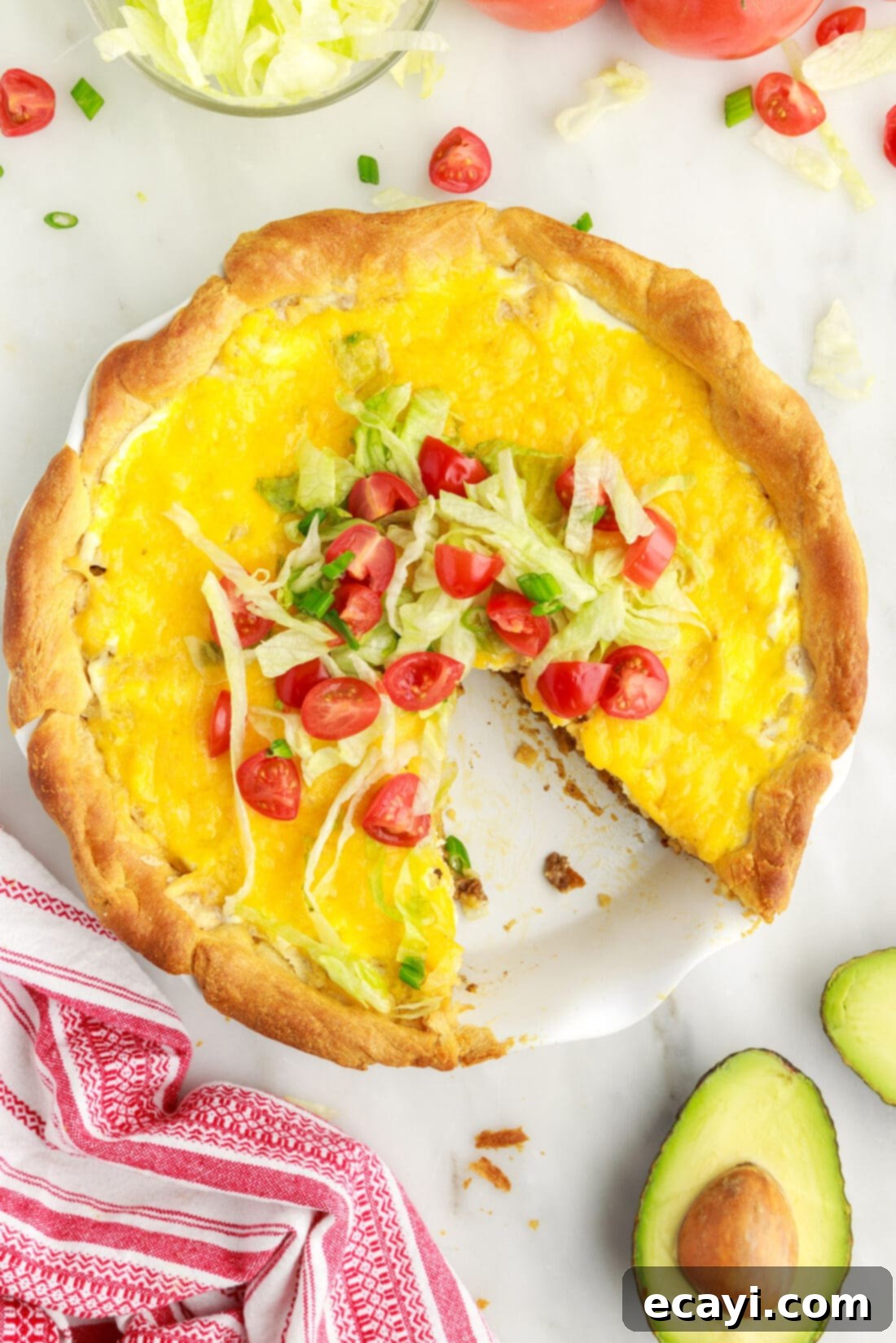 Ultimate Taco Casserole 2 overhead photo of Taco Pie with fresh toppings