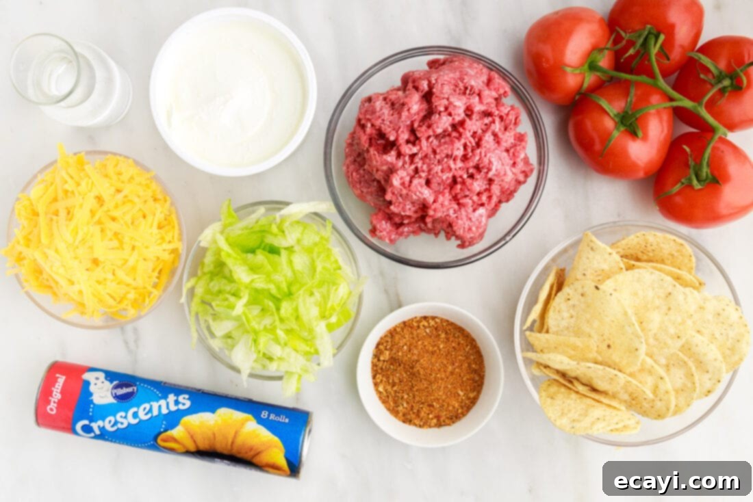 Ultimate Taco Casserole 4 Taco Pie ingredients laid out on a table