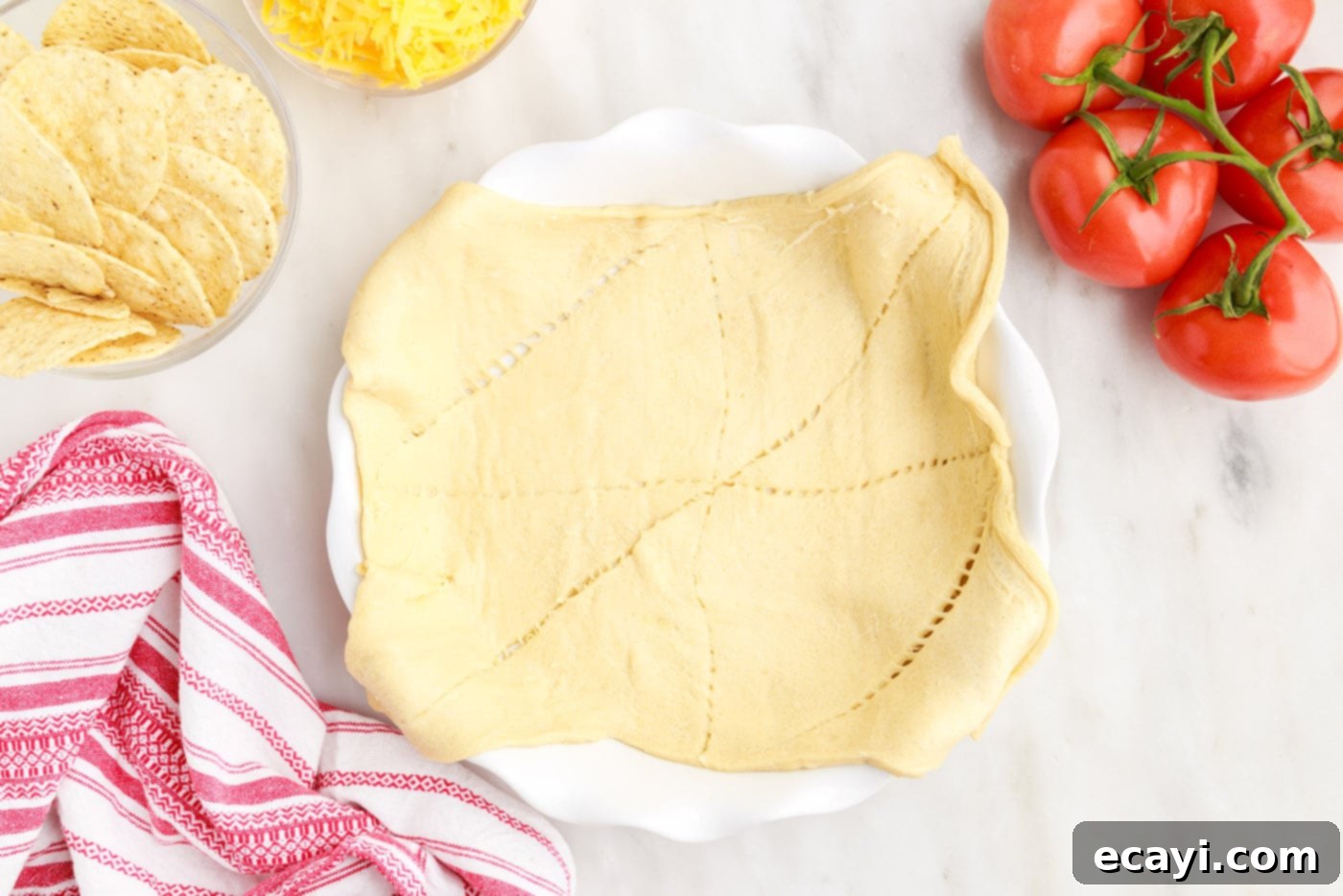 Ultimate Taco Casserole 6 crescent rolls in a pie plate