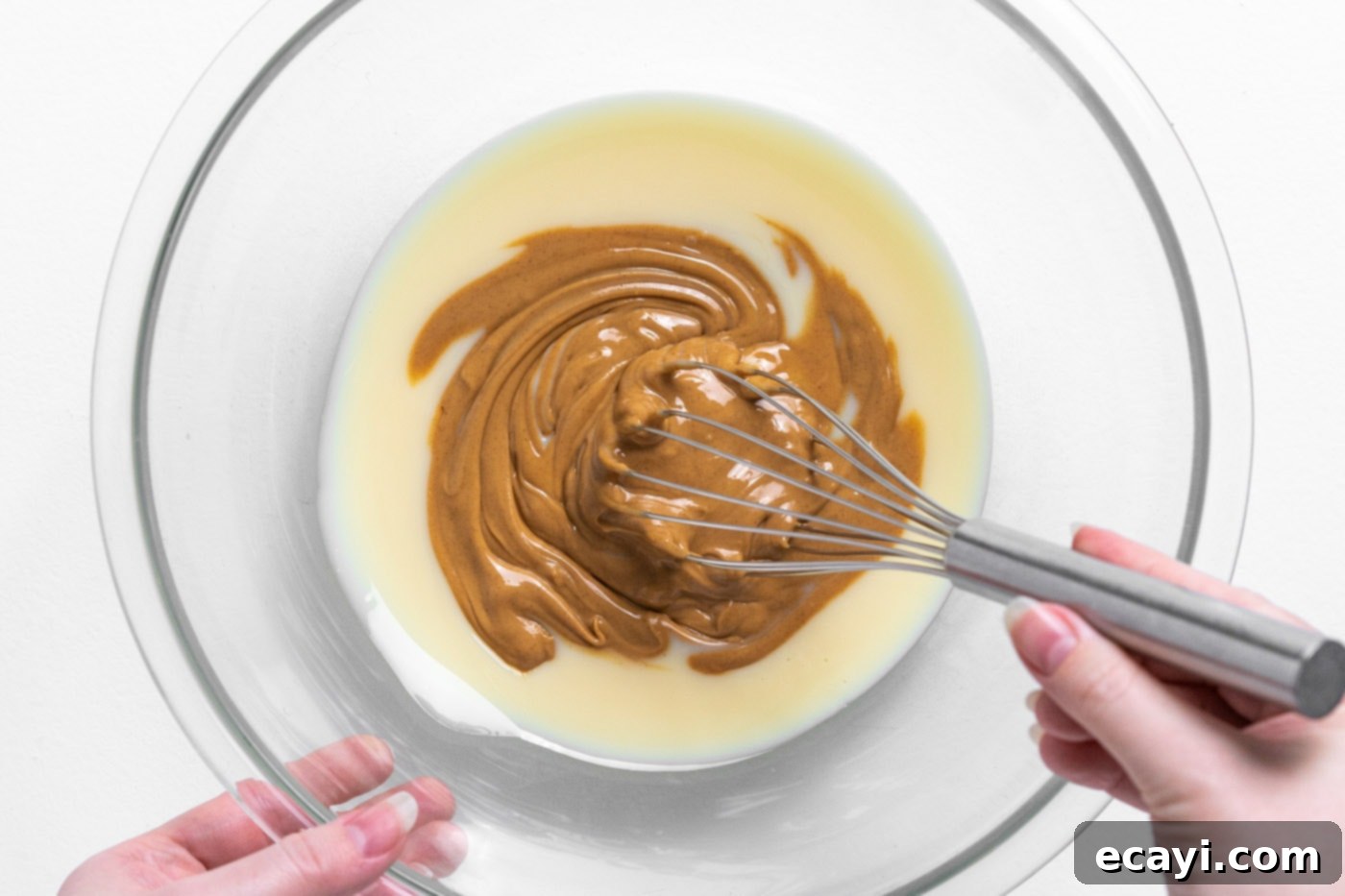 Peanut Butter Chocolate Chip Dream 5 Whisking sweetened condensed milk and peanut butter together in a large bowl