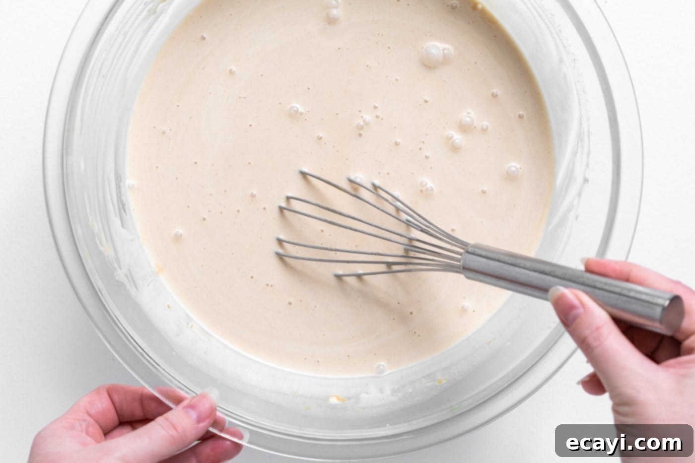 Peanut Butter Chocolate Chip Dream 7 Whisking all peanut butter ice cream ingredients in a bowl
