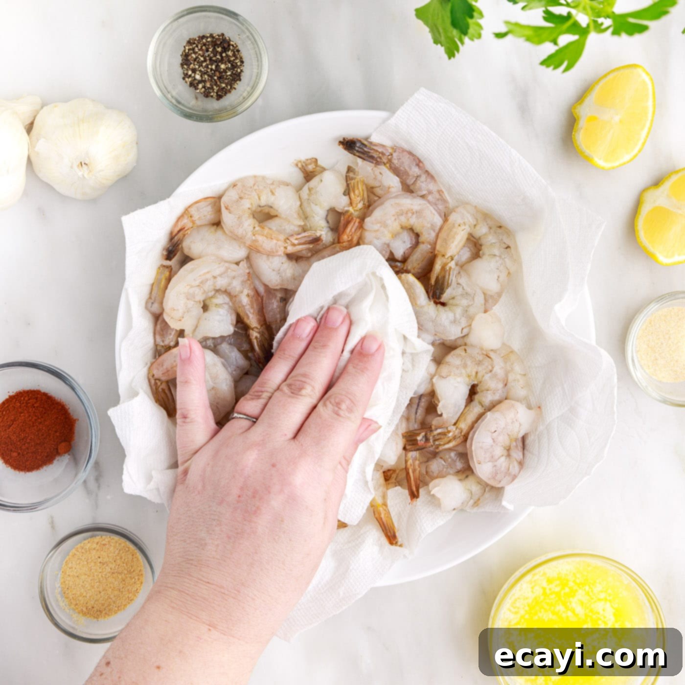 Crispy Air Fryer Shrimp 5 patting shrimp dry with paper towel