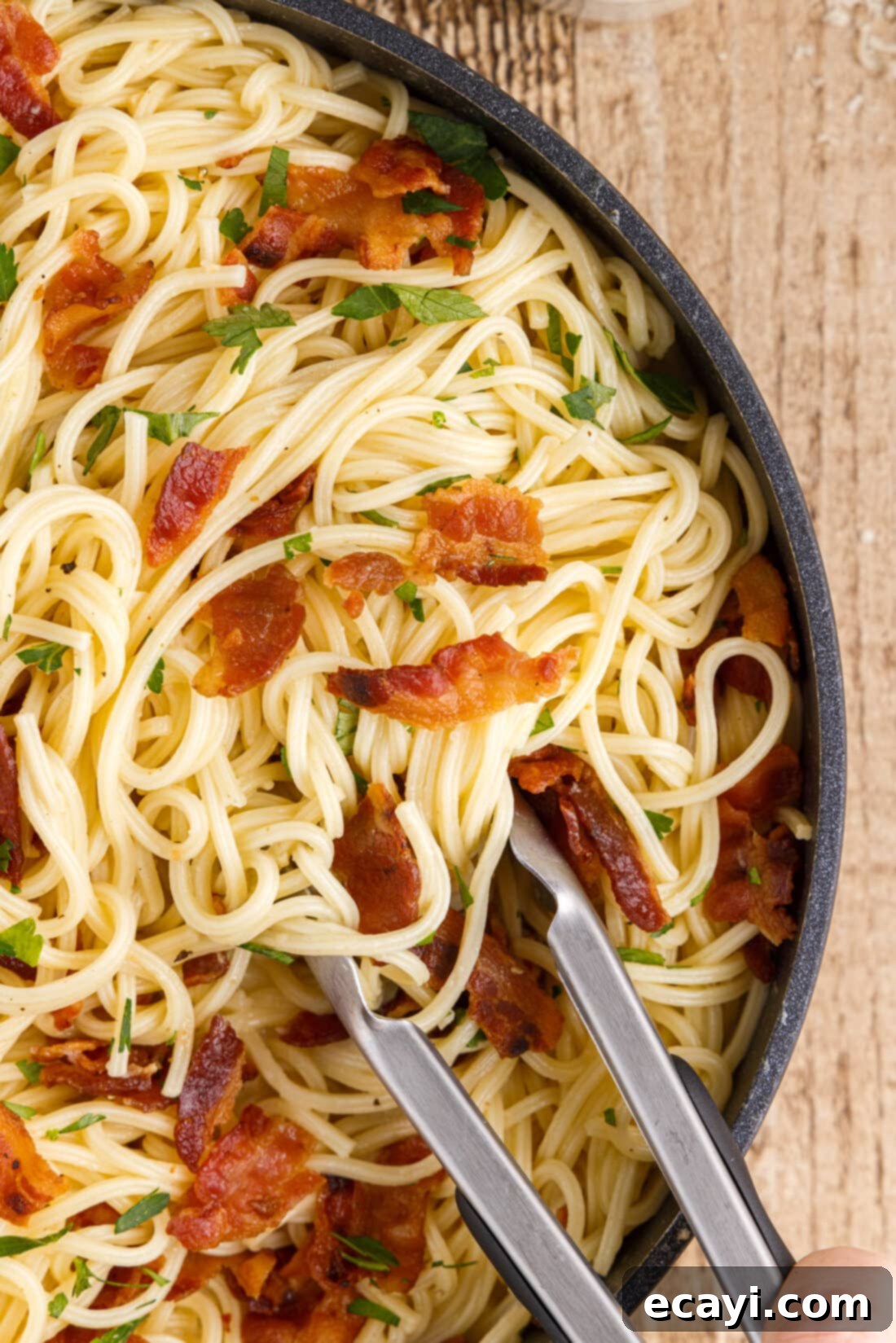 Authentic Pasta Carbonara 2 Pasta Carbonara with tongs
