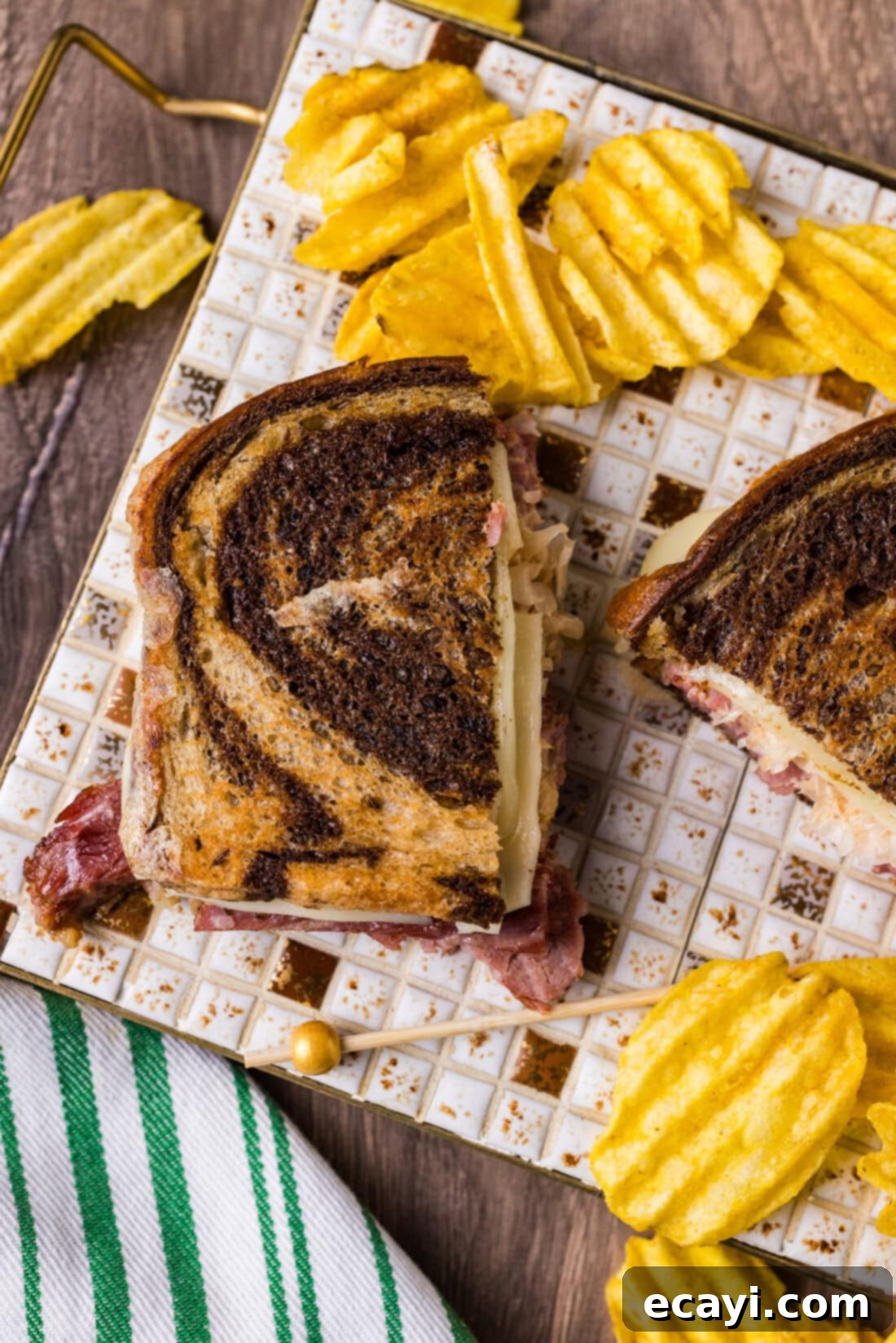 Classic Reuben Sandwich 10 Overhead photo of a Reuben sandwich cut in half, showcasing its hearty layers and golden-brown bread.