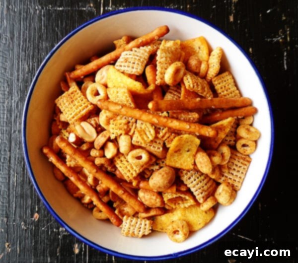 Taco Chex Mix A closer overhead shot of a bowl of homemade Taco Chex Mix, highlighting the rich taco seasoning.
