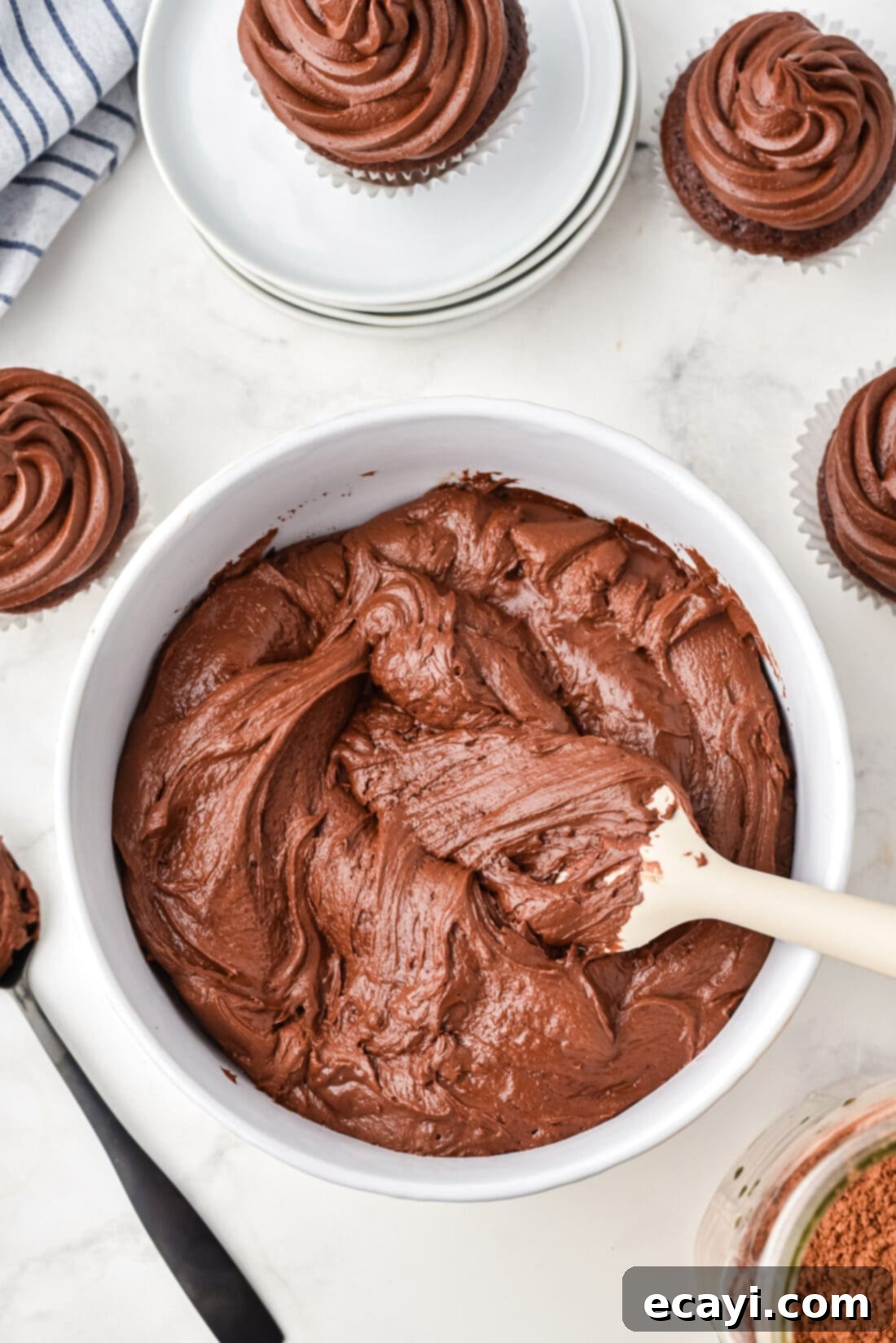 Velvet Chocolate Fudge Bliss 2 Rich and Silky Chocolate Fudge Frosting in a bowl, ready to be used