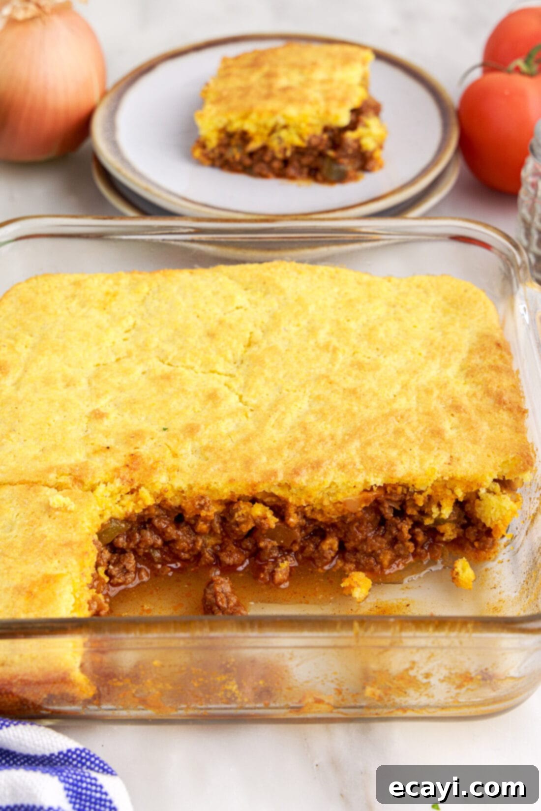 Hearty Sloppy Joe Cornbread Bake 5 pan of Sloppy Joe Cornbread Casserole, freshly baked and ready to serve