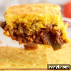 Hearty Sloppy Joe Cornbread Bake 6 Sloppy Joe Cornbread Casserole, a close-up of a square slice