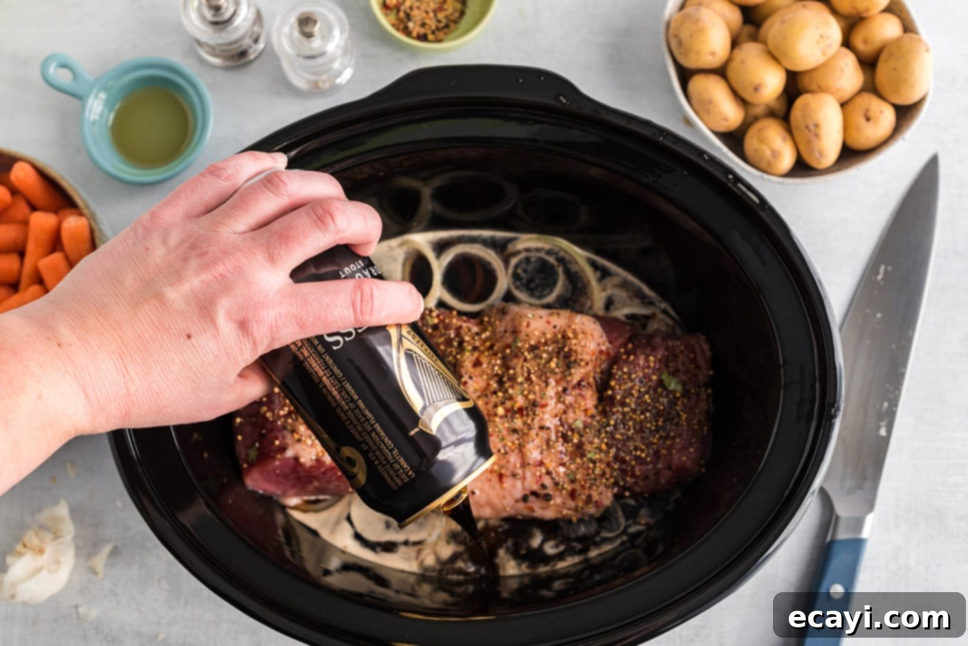 Slow-Cooked Tender Corned Beef 6 Poring beer over crockpot corned beef