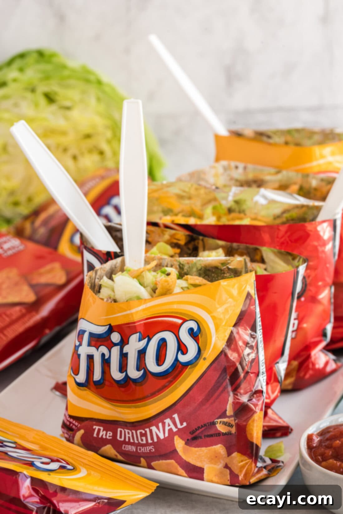 Portable Taco Crunch 2 Assorted Walking Tacos on a serving tray, ready for a party