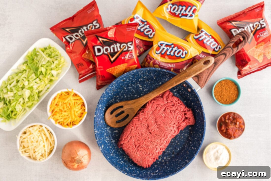 Portable Taco Crunch 4 Ingredients for making Walking Tacos laid out on a table