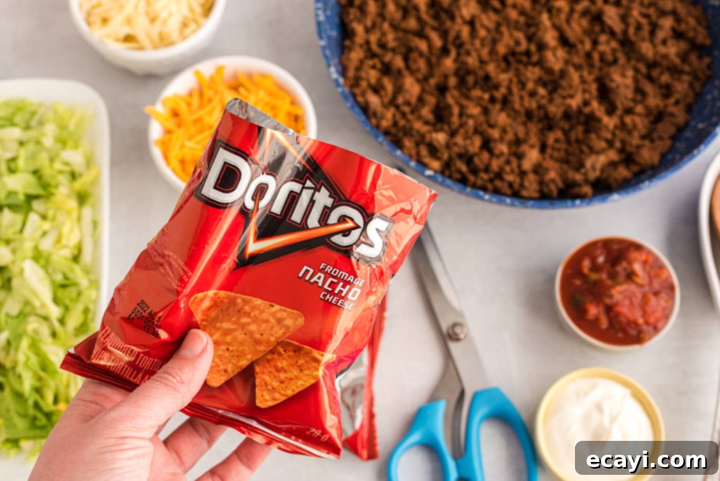 Portable Taco Crunch 7 Chip bag with the top cut off, ready for fillings