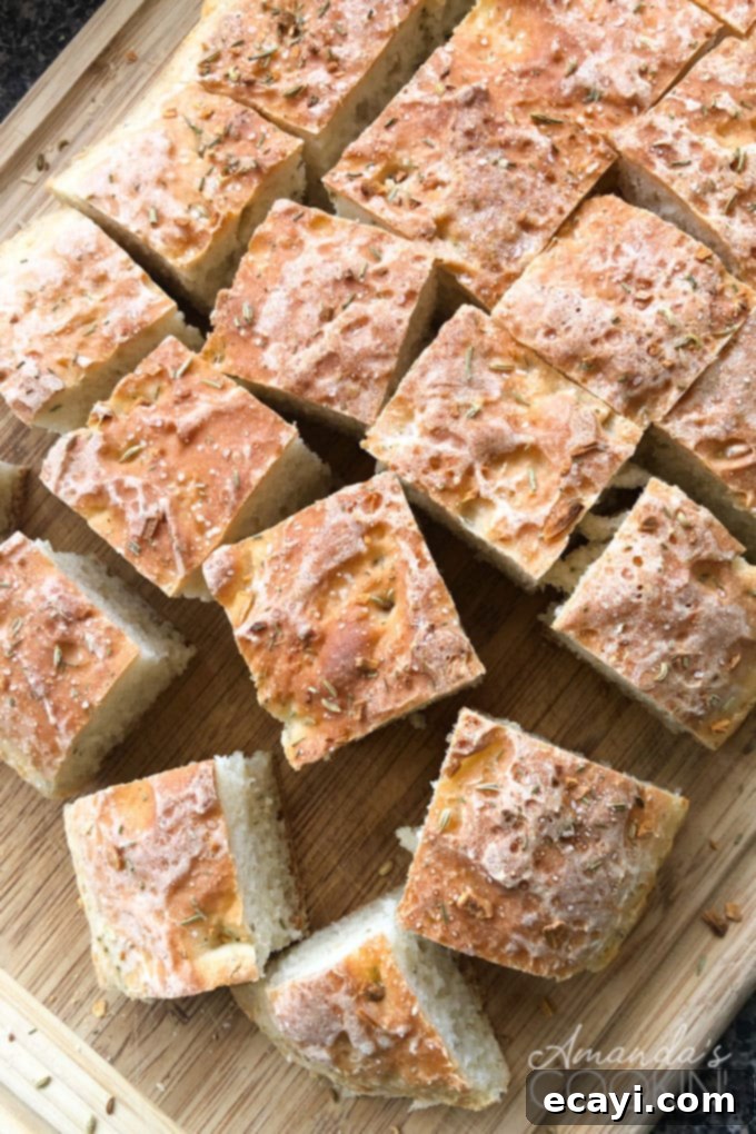 The Everyday Hearth Bread 3 peasant bread cut into squares on a wooden cutting board