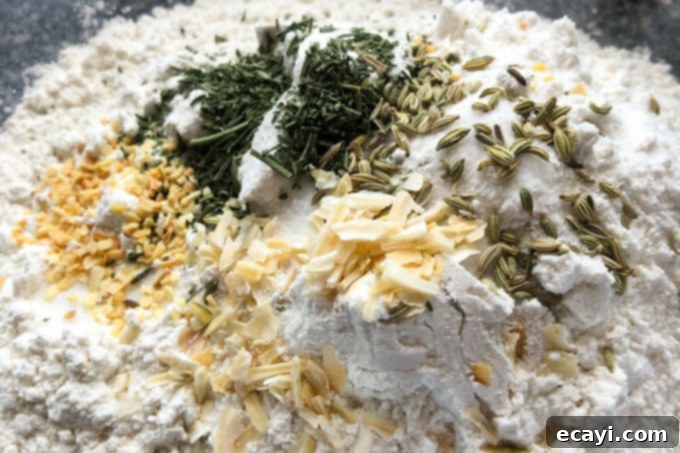 The Everyday Hearth Bread 6 flour with herbs and spices sprinkled on top
