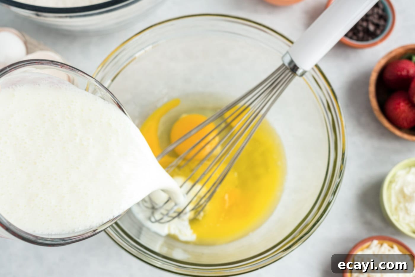 Fluffy Cottontail Stacks 6 whisking buttermilk in with eggs and butter