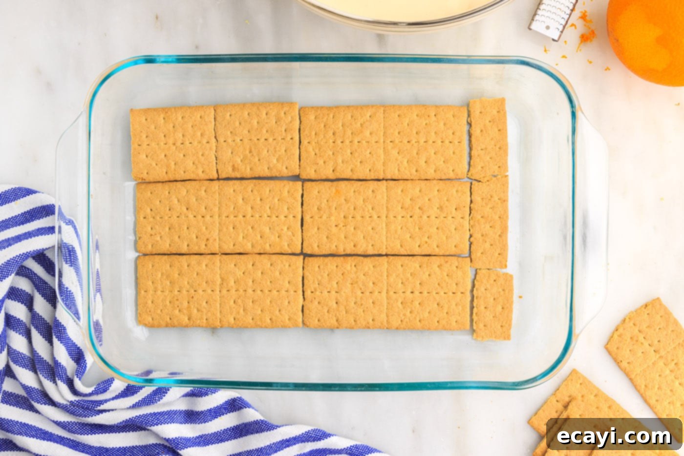 Orange Dreamsicle Delight 12 graham crackers on bottom of a baking dish