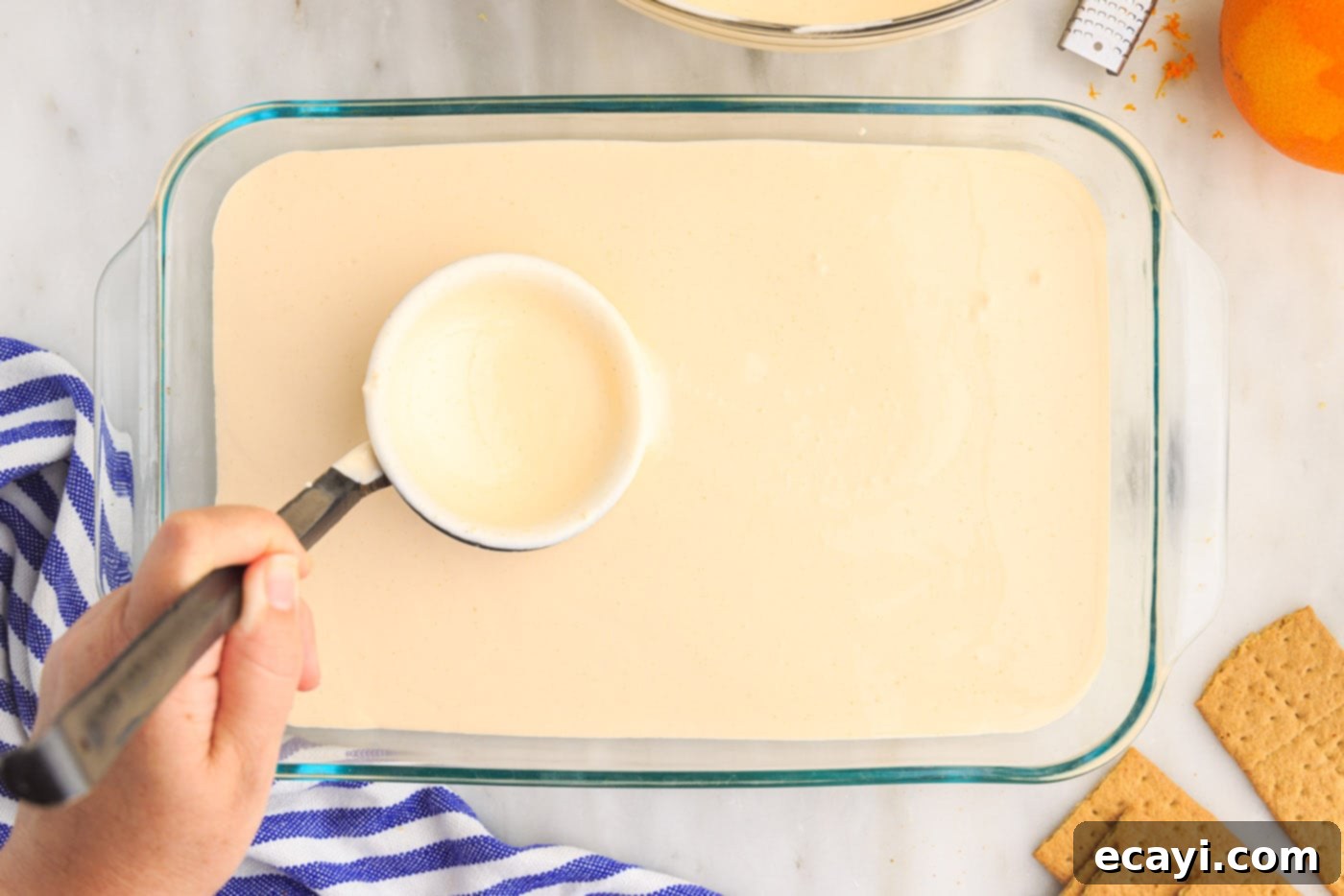 Orange Dreamsicle Delight 13 orange pudding mix over graham crackers in baking dish