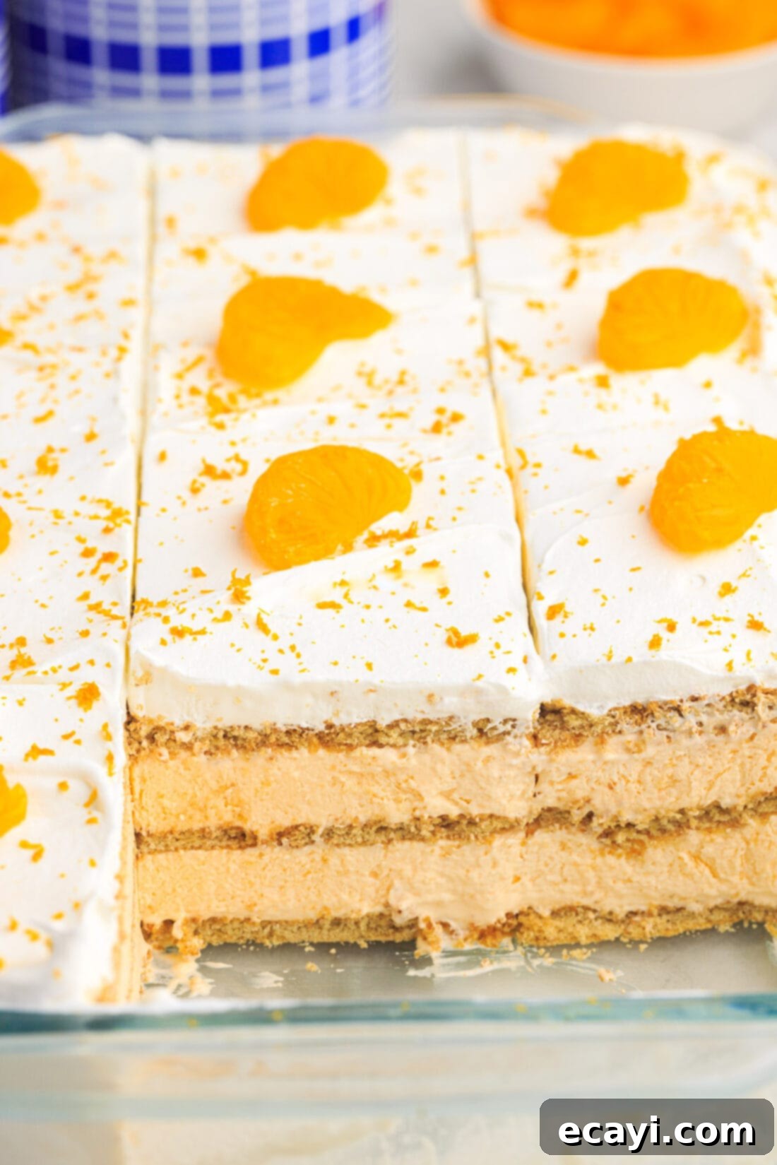 Orange Dreamsicle Delight 3 pan of Orange Icebox Cake cut into pieces