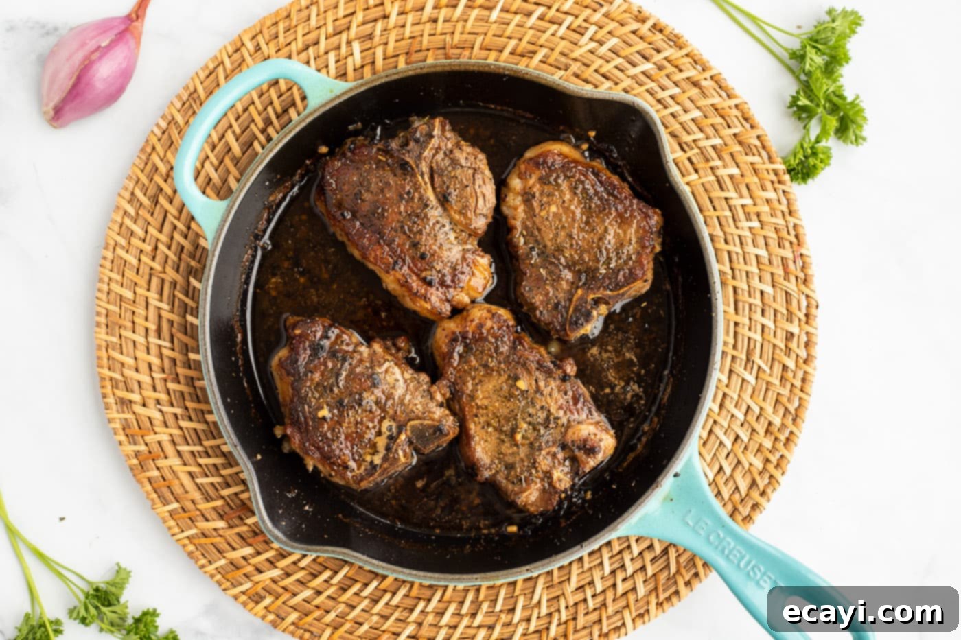 Succulent Herb-Crusted Lamb Chops 10 Lamb chops simmering in white wine reduction before going into the oven