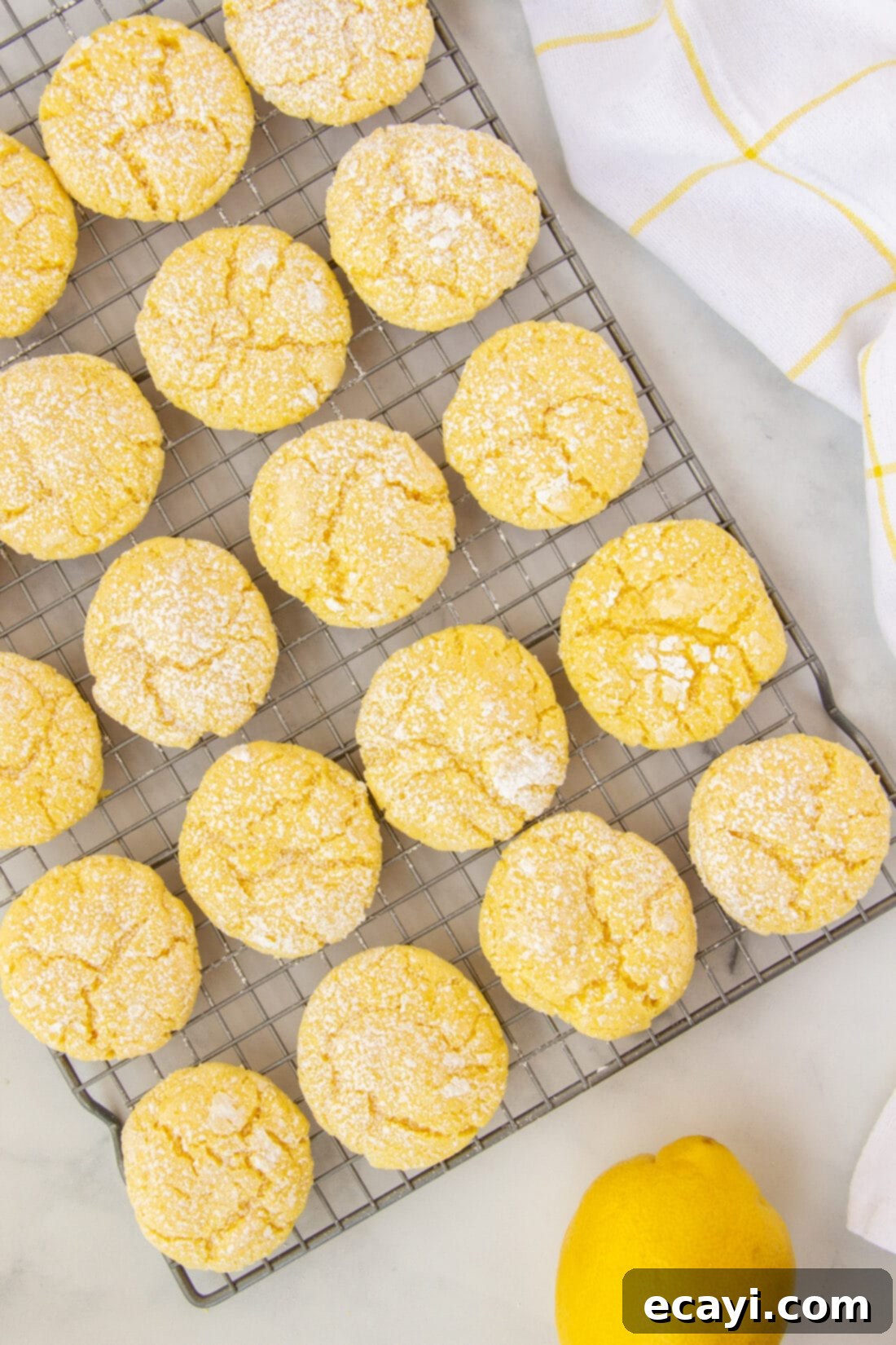 Bright Lemon Cake Mix Cookies 3 Lemon Cake Mix Cookies cooling on a wire rack