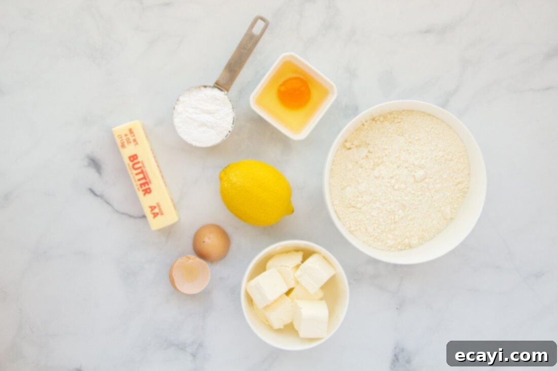 Bright Lemon Cake Mix Cookies 4 Ingredients for Lemon Cake Mix Cookies laid out on a table