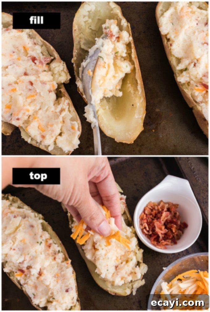 Stuffed Potato Delights 3 Filled potato skins piled high with creamy potato mixture, ready for their second bake on a baking sheet.
