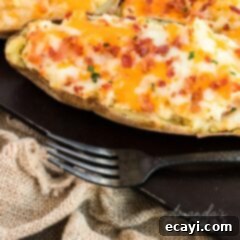 Stuffed Potato Delights 5 twice baked potato sitting on metal pan