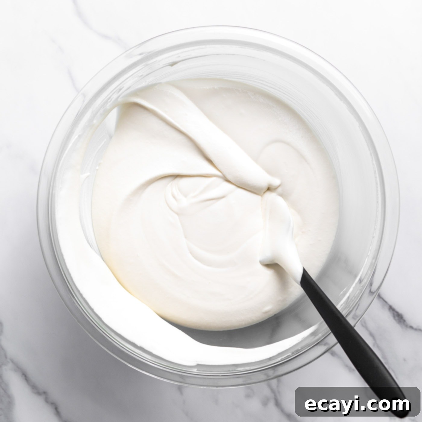 No-Fuss Creamy Ice Cream 10 Smooth and airy homemade vanilla ice cream mixture in a bowl, ready for freezing