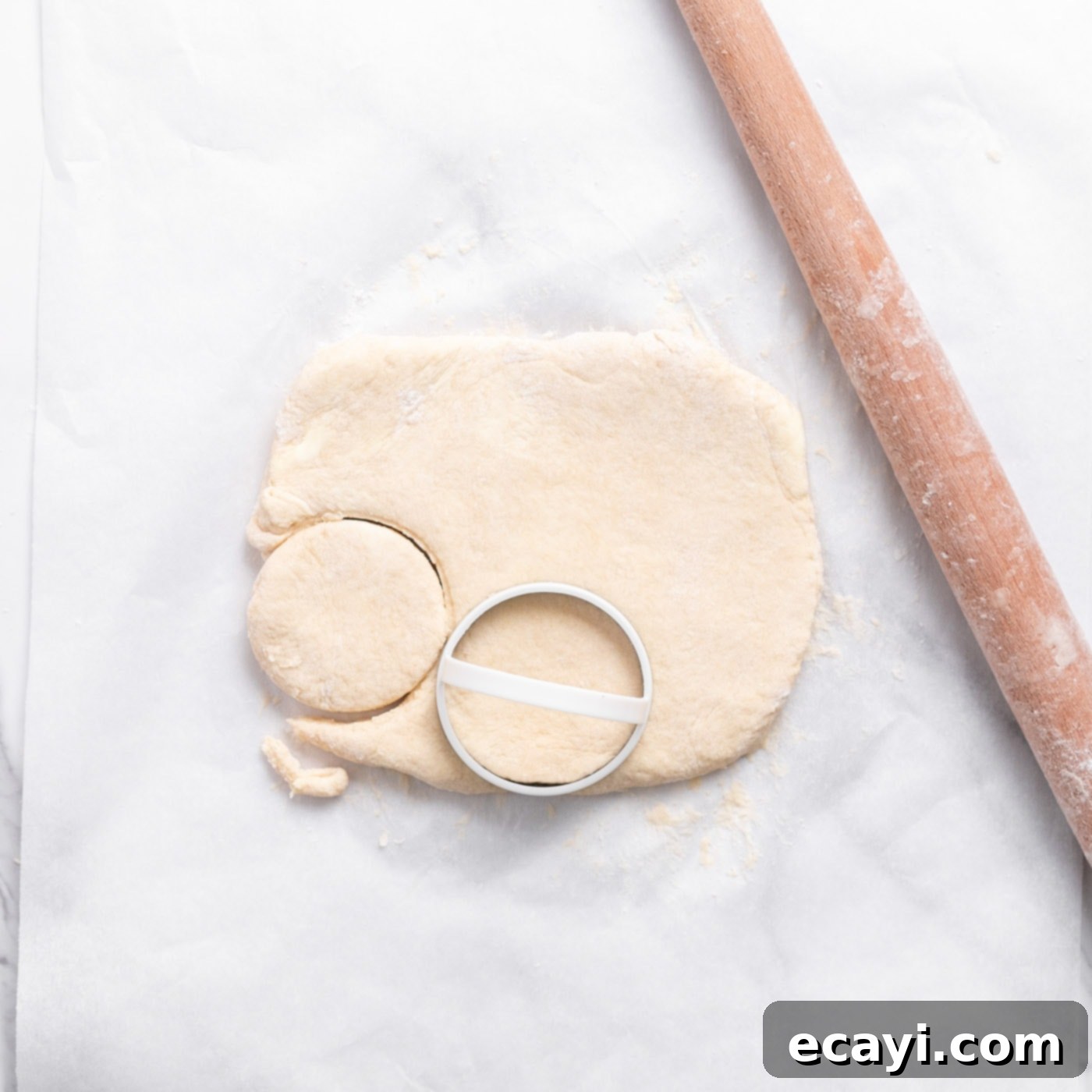 Garden Fresh Strawberry Shortcake 12 Biscuit cutters stamping out dough circles on a floured surface