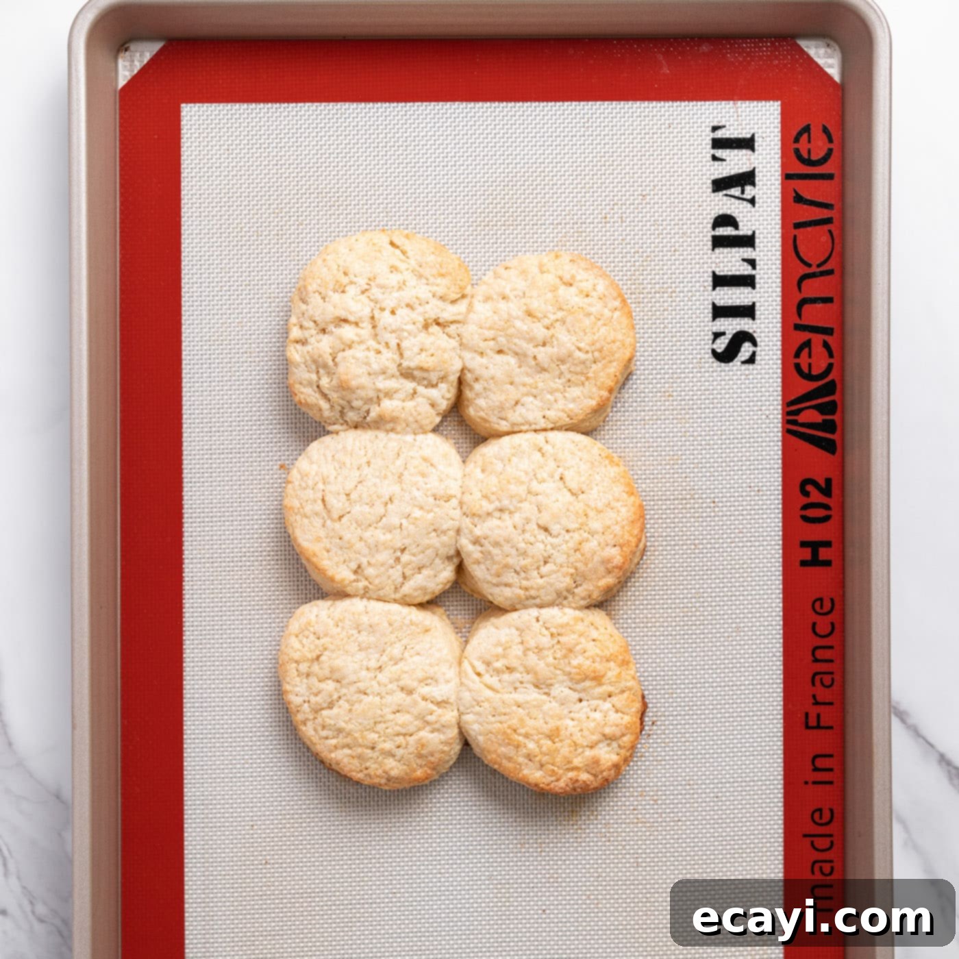 Garden Fresh Strawberry Shortcake 15 Freshly baked golden brown biscuits on a baking sheet