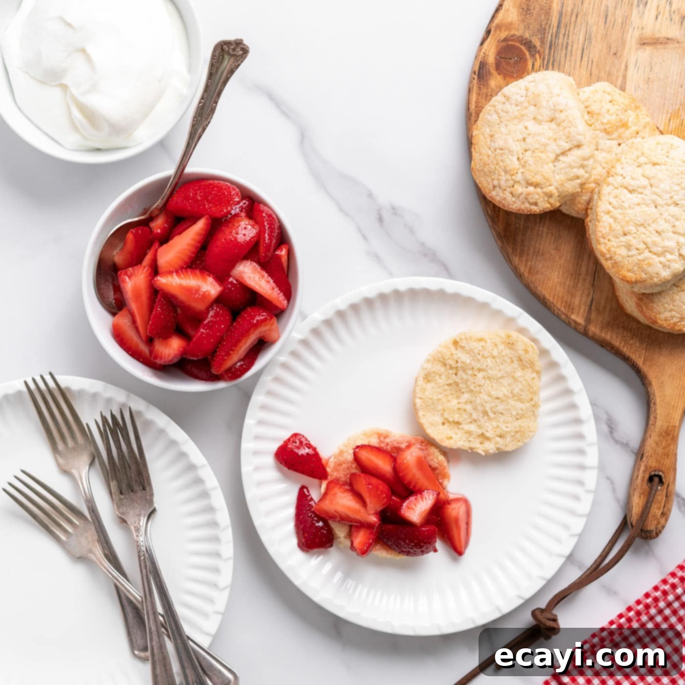 Garden Fresh Strawberry Shortcake 17 Macerated strawberries piled onto the bottom half of a shortcake biscuit