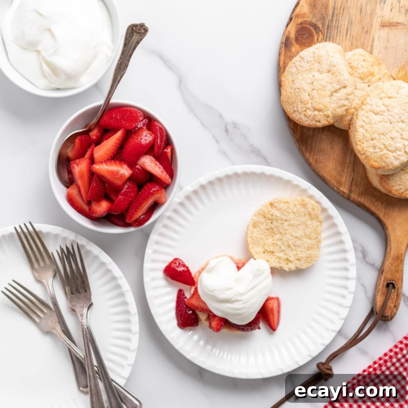 Garden Fresh Strawberry Shortcake 18 Finished strawberry shortcake with whipped cream and a whole strawberry on top