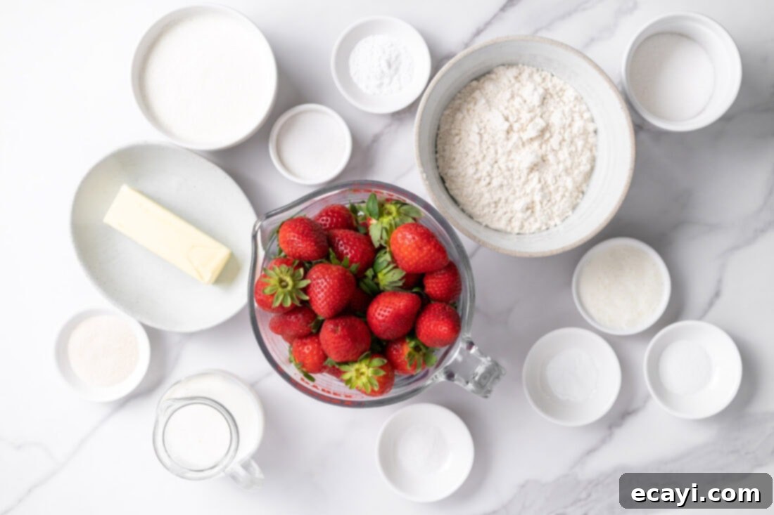 Garden Fresh Strawberry Shortcake 4 Ingredients laid out for making Strawberry Shortcake, including fresh strawberries, butter, flour, and cream