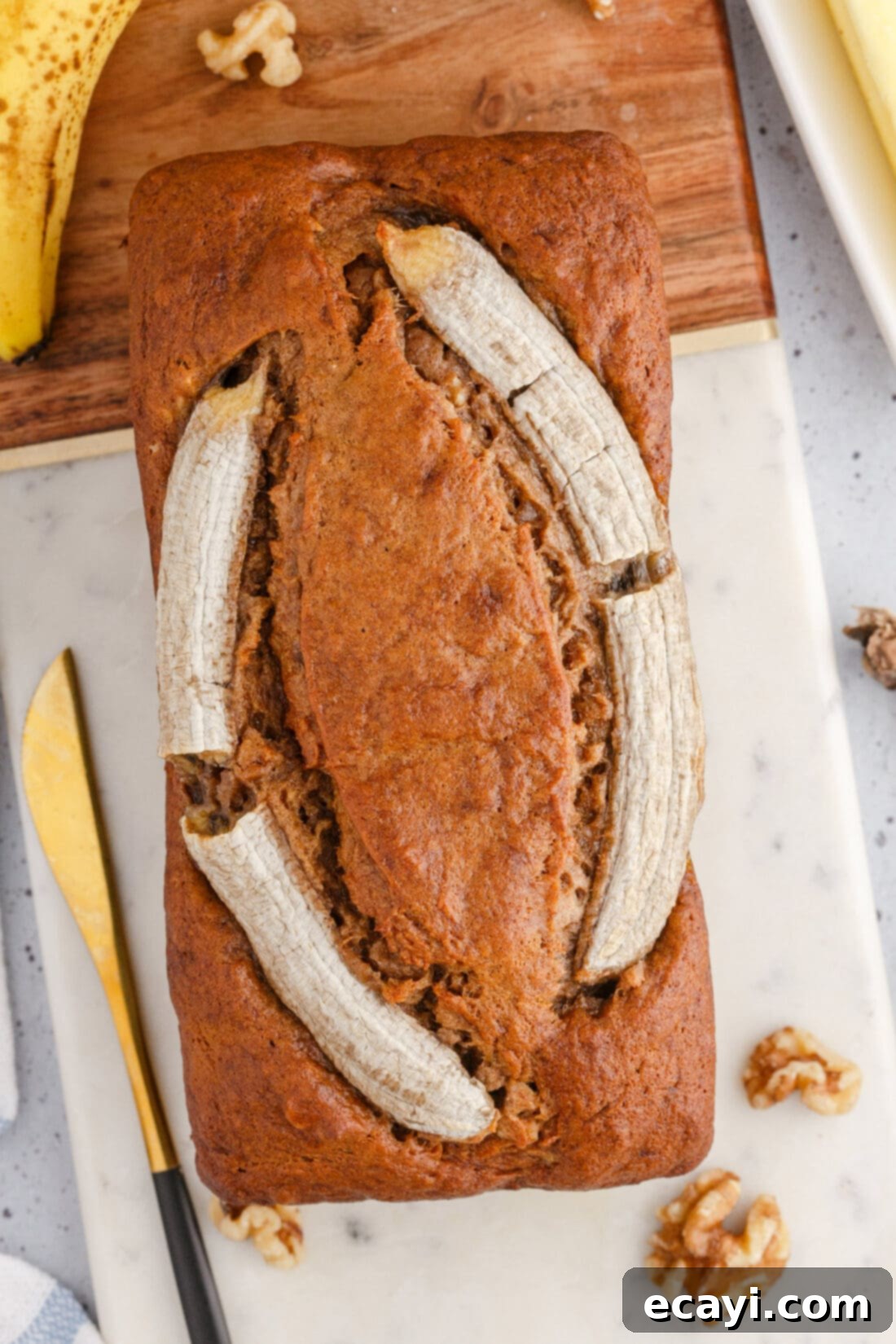 Homestyle Banana Nut Delight 3 overhead view of Banana Nut Bread with banana garnish