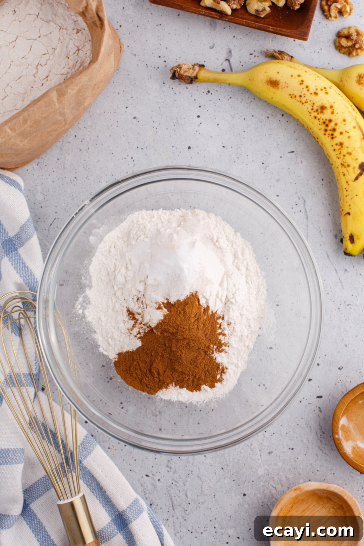 Homestyle Banana Nut Delight 5 dry ingredients for banana nut bread in a mixing bowl