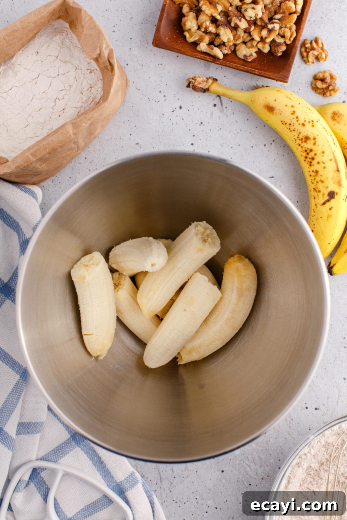 Homestyle Banana Nut Delight 6 bananas in a mixing bowl
