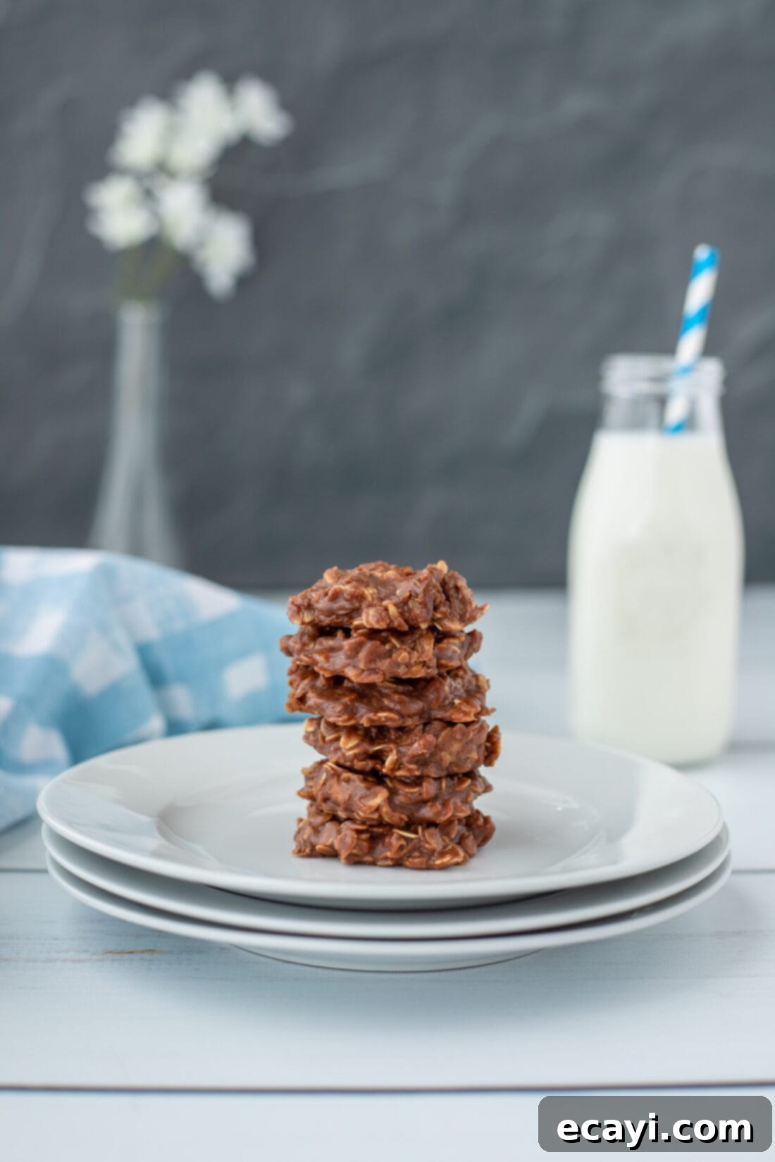 Quick Chocolate No-Bake Delights 2 Stack of freshly made Chewy Chocolate No-Bake Cookies on a white plate