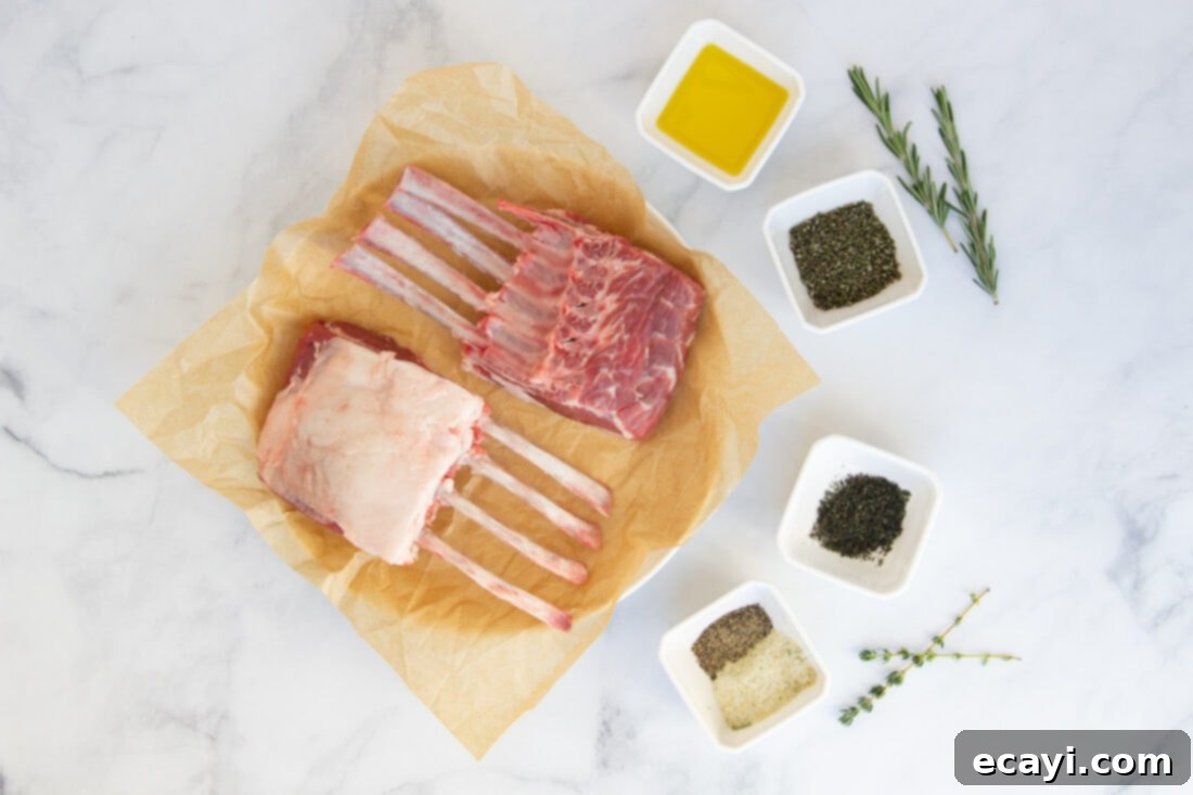 The Butcher's Crown 4 A collection of ingredients for rack of lamb including fresh rosemary, thyme, garlic salt, black pepper, and olive oil.