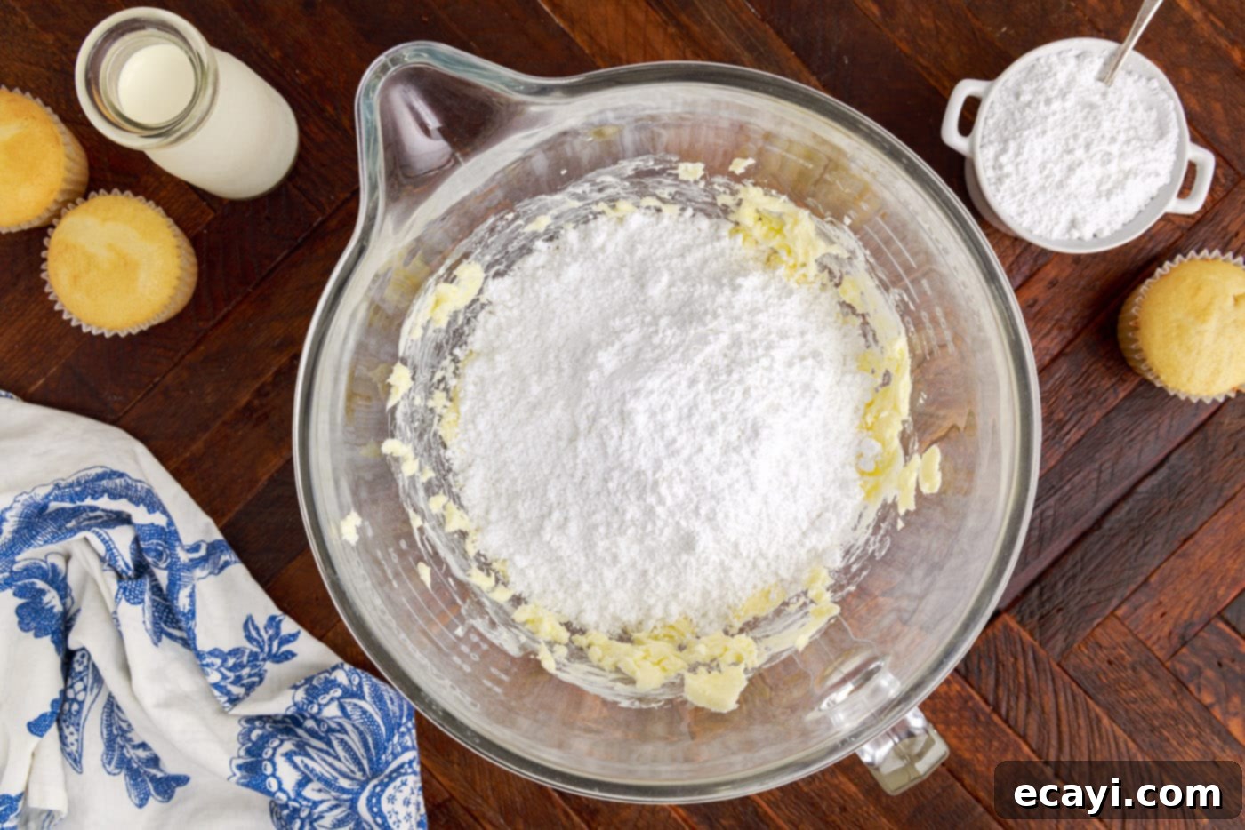 Silky Buttercream Dreams 6 powdered sugar and butter in a mixing bowl