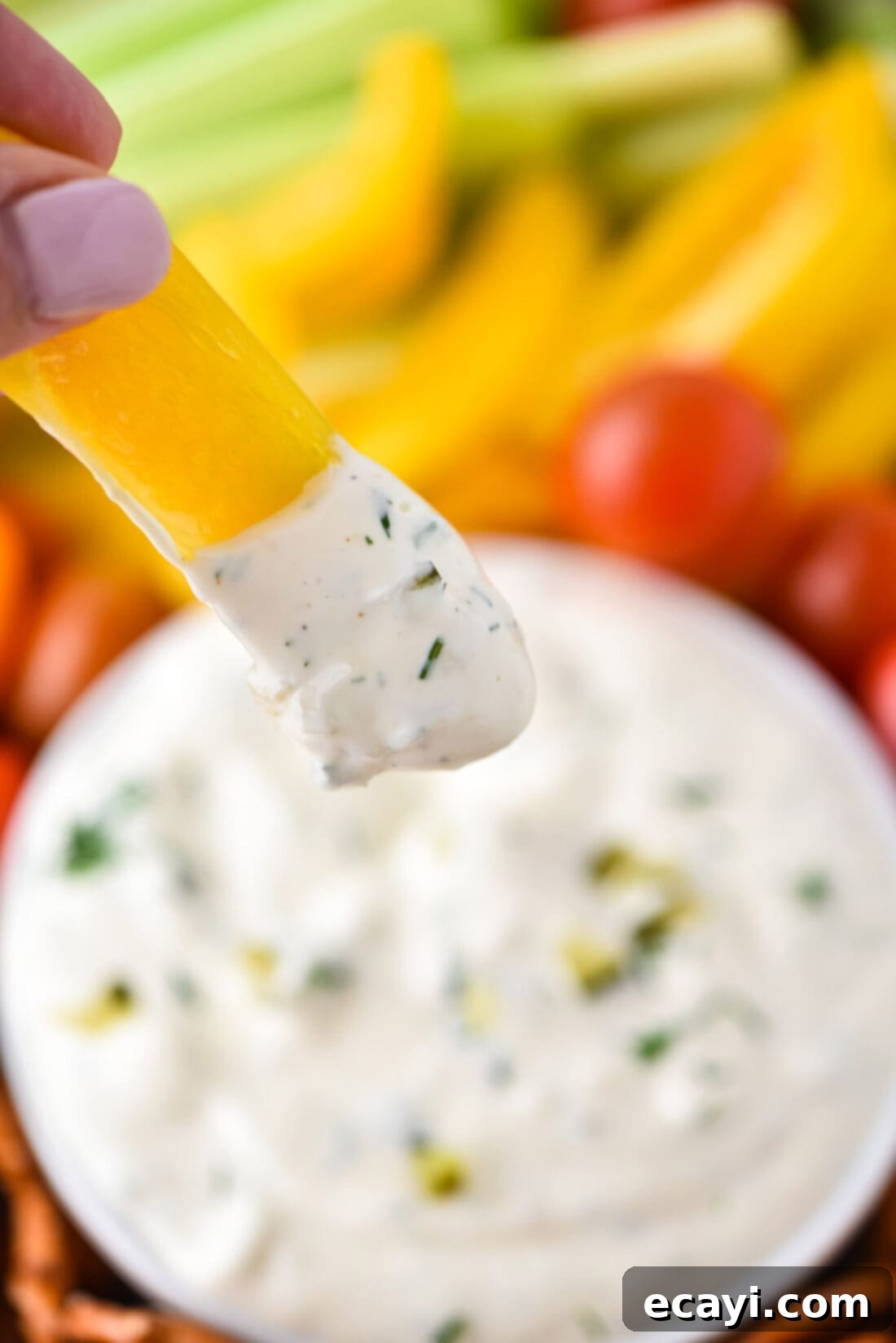Dill Pickle Delight Dip 9 Yellow bell pepper slice dipped into creamy Dill Pickle Dip