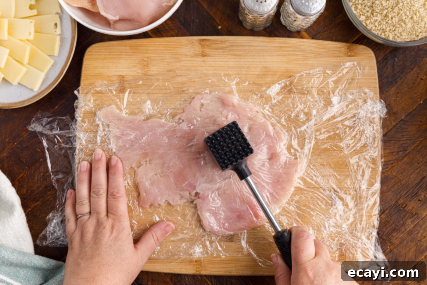 Gourmet Stuffed Chicken Rolls 5 Pouding boneless, skinless chicken breast with a meat tenderizer between plastic wrap for even thinness