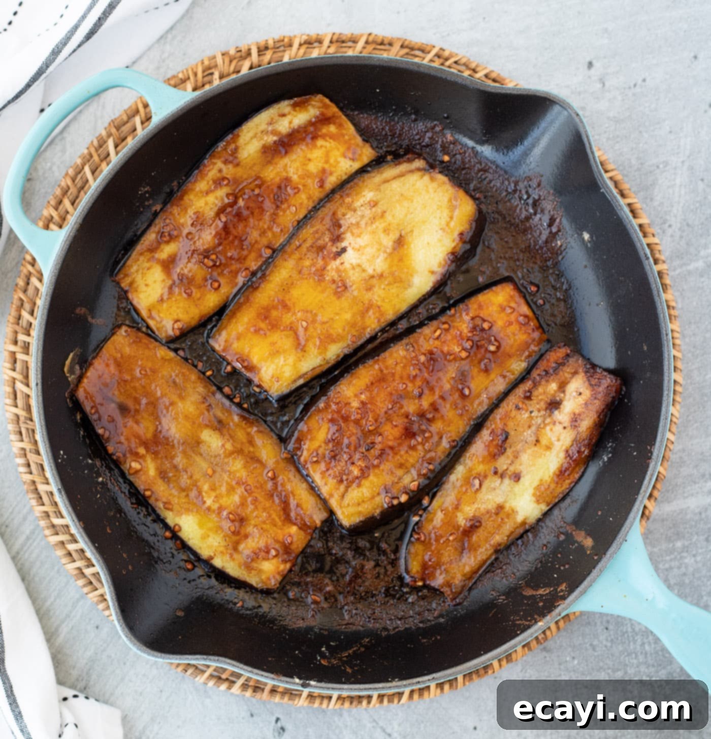 Sticky Soy Glazed Eggplant 7 cooked eggplant in a skillet